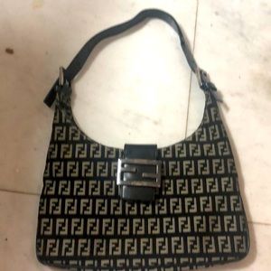 Authentic Fendi monogram baguette with adjustable strap